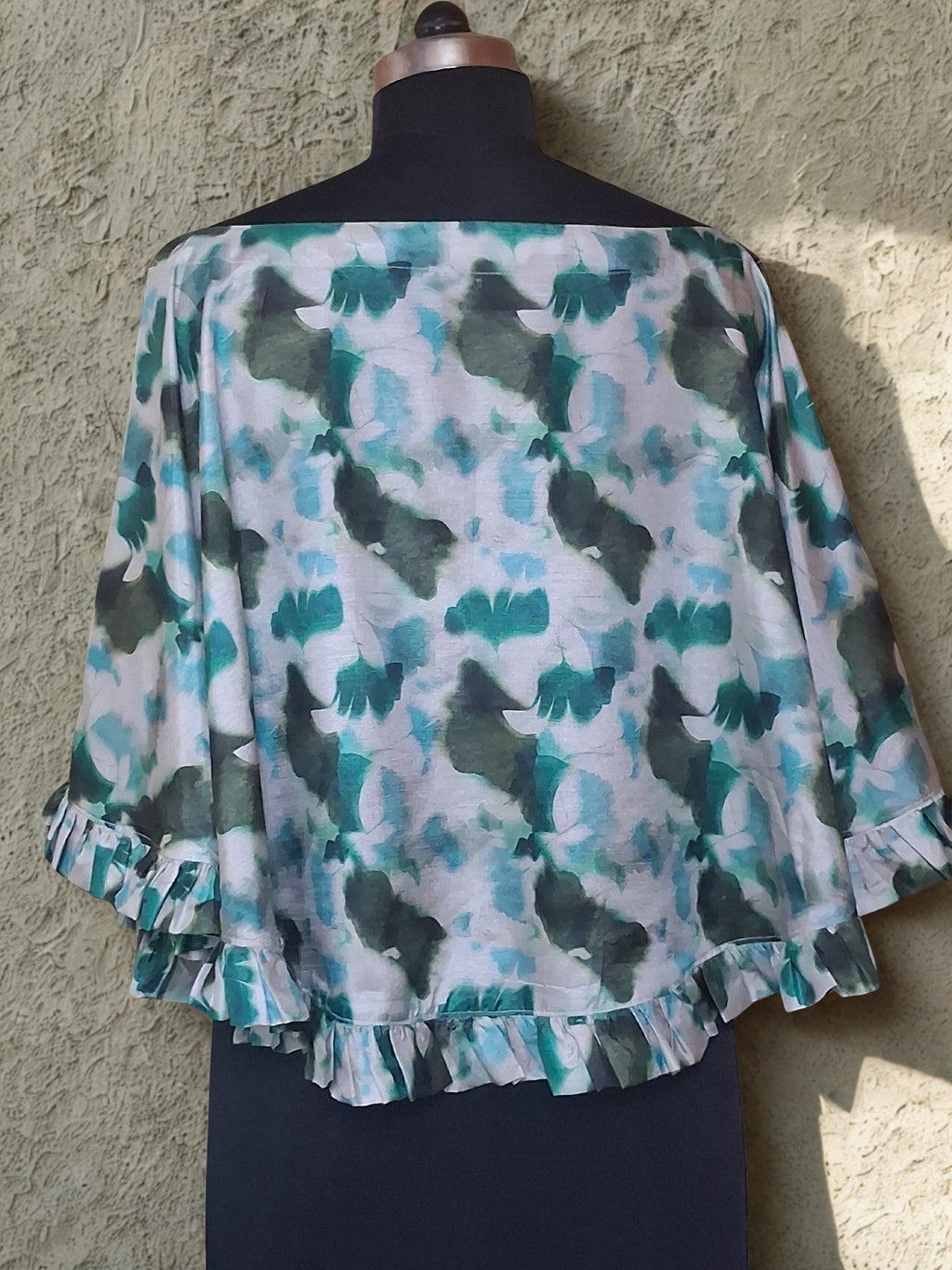 SHORT FREESTYLE PONCHO